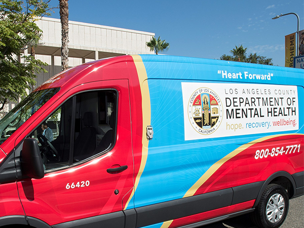 A Los Angeles County mental health van, promoting hope and recovery, parked in a community area to support those in need.