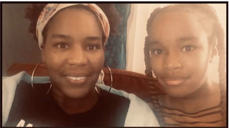 A mother and daughter smile together, reflecting their bond and journey towards stability and hope in Los Angeles.