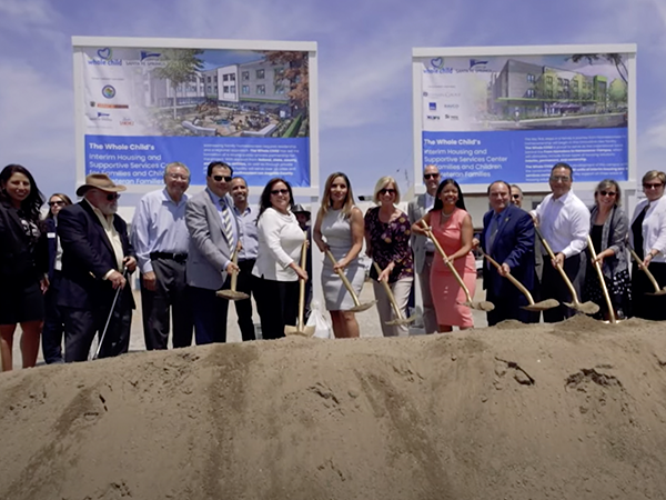 Community leaders and stakeholders gather for a groundbreaking ceremony for new supportive housing in Los Angeles.