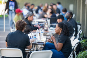 LA County workers and registration tables during a Pathway Home operation in Santa Fe Springs.
