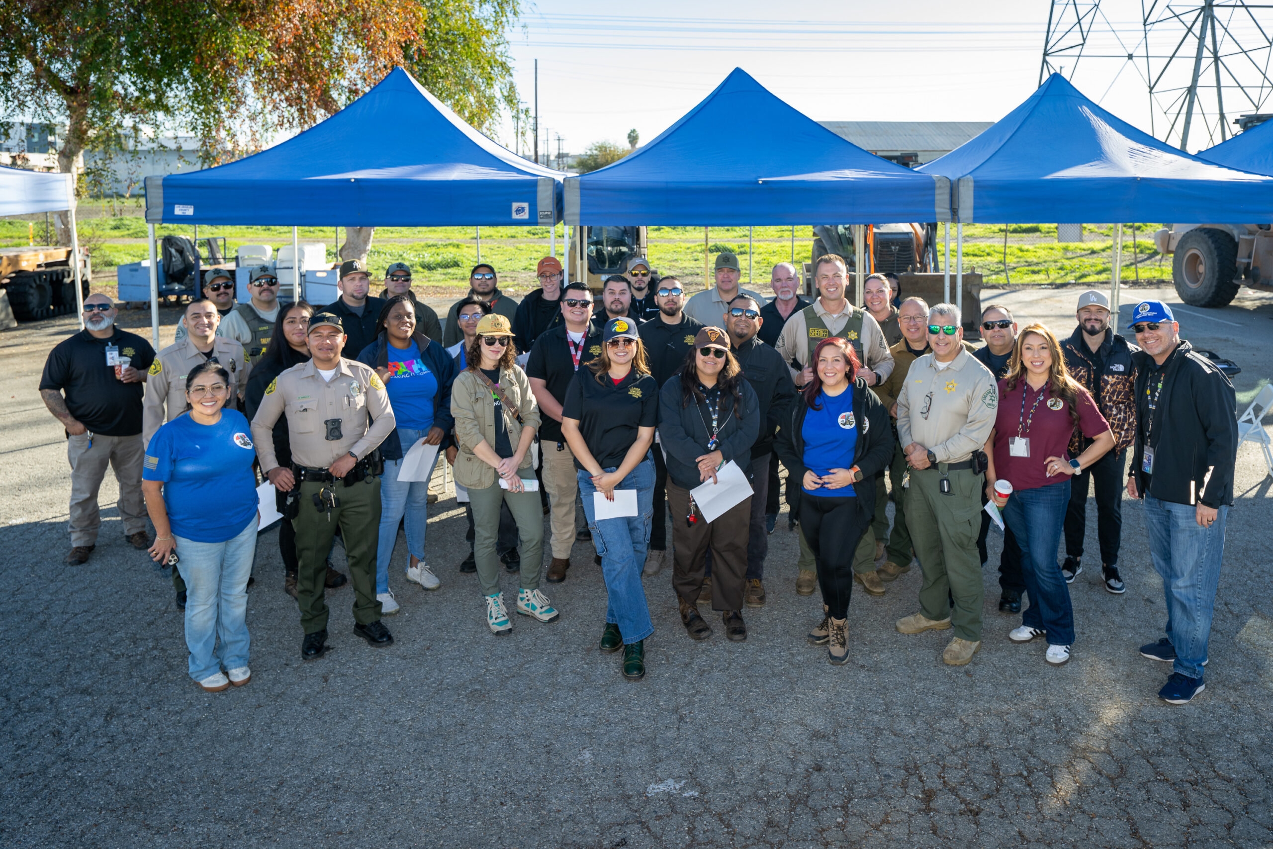 Group photo before a Pathway Home operation in South Gate, Dec. 10, 2025. (Photo by Michael Owen Baker)