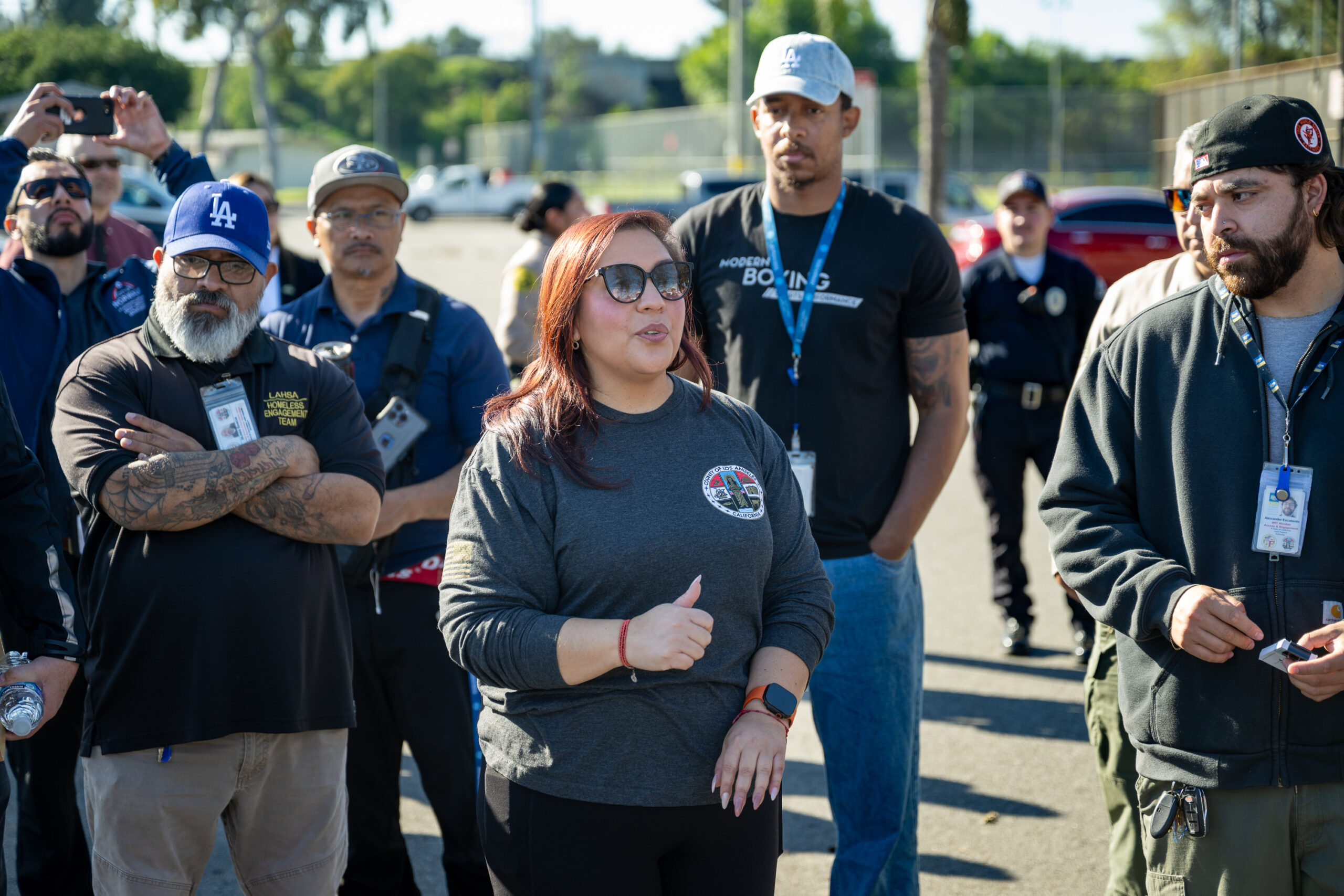 LA County HSH analyst Vanessa Guillen speaks to outreach workers at a Pathway Home operation in Bellflower, Wednesday, Feb. 25, 2026. (Photo by Michael Owen Baker)