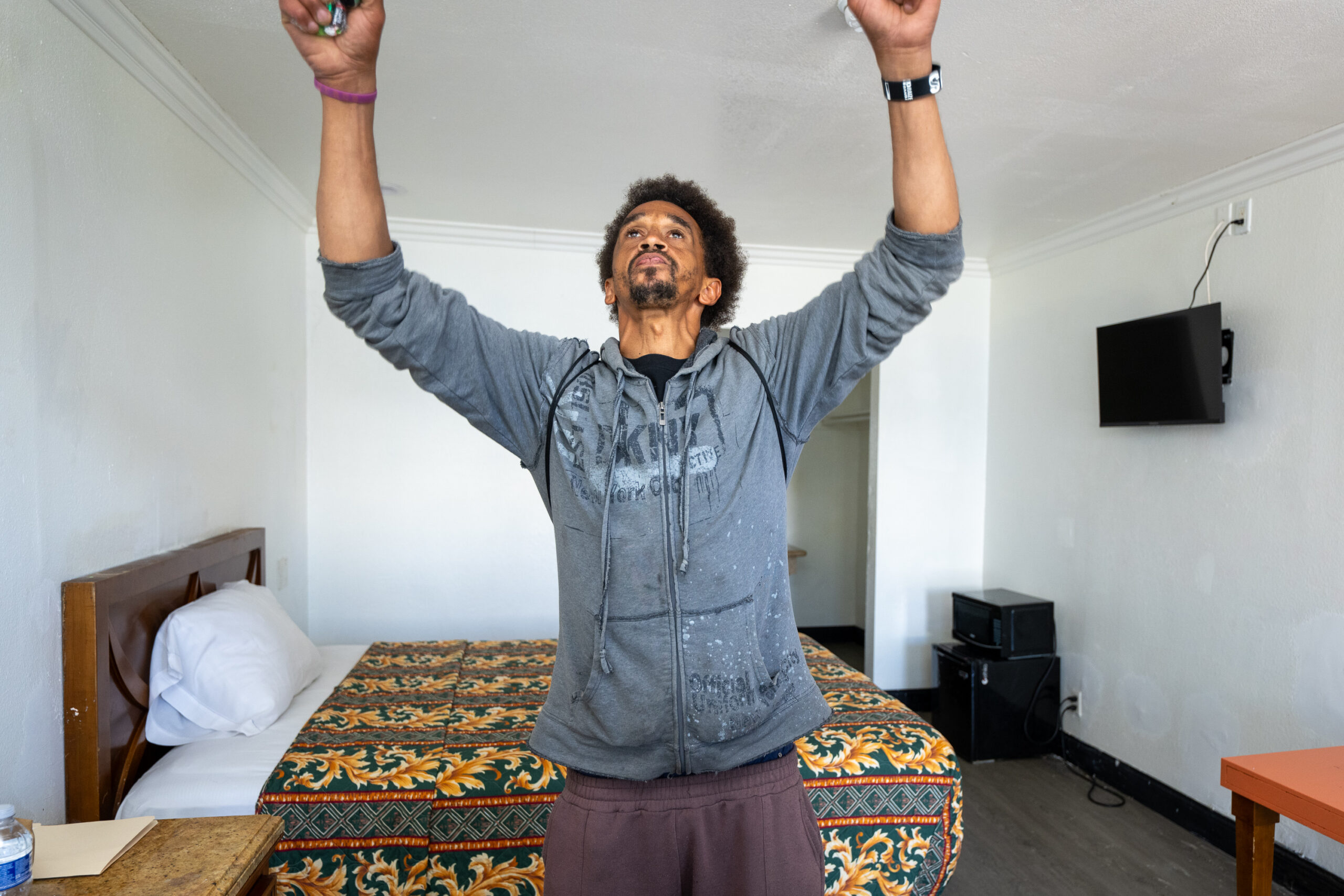 Edmond gets emotional upon seeing his interim housing during a Pathway Home operation in Willowbrook, Wednesday, April 1, 2026. (Photo by Michael Owen Baker)